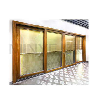Porte vitrée Porte coulissante en aluminium à grain de bois avec double verre trempé et bon scellement