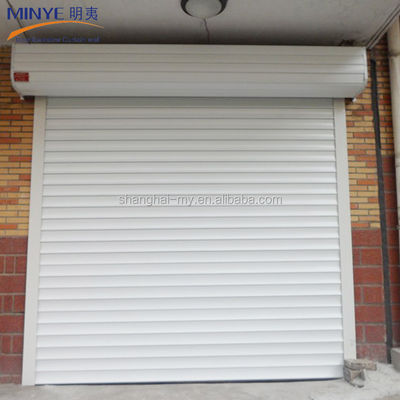 Industrie hôtelière Porte de garage électrique à profil d'aluminium avec méthode d'ouverture par traction en roulement