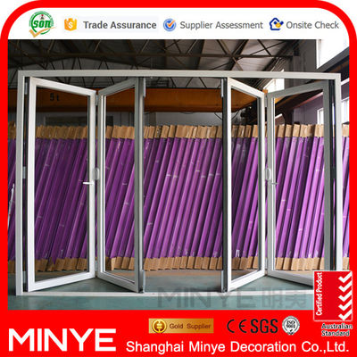 Porte pivotante en alliage d'aluminium Porte en verre en acier double pour immeubles commerciaux