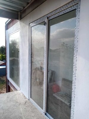 Système d'étanchéité double EPDM Porte coulissante en aluminium à rupture thermique pour isolation acoustique