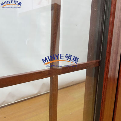 Fenêtre à carreaux ronds en aluminium à rupture thermique avec grain de bois et revêtement anodisé