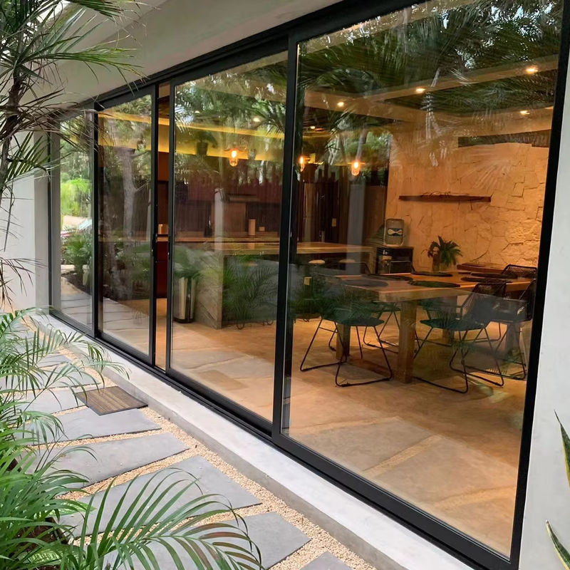Isolation acoustique Porte coulissante en verre en UPVC de style français pour un flux intérieur-extérieur sans couture